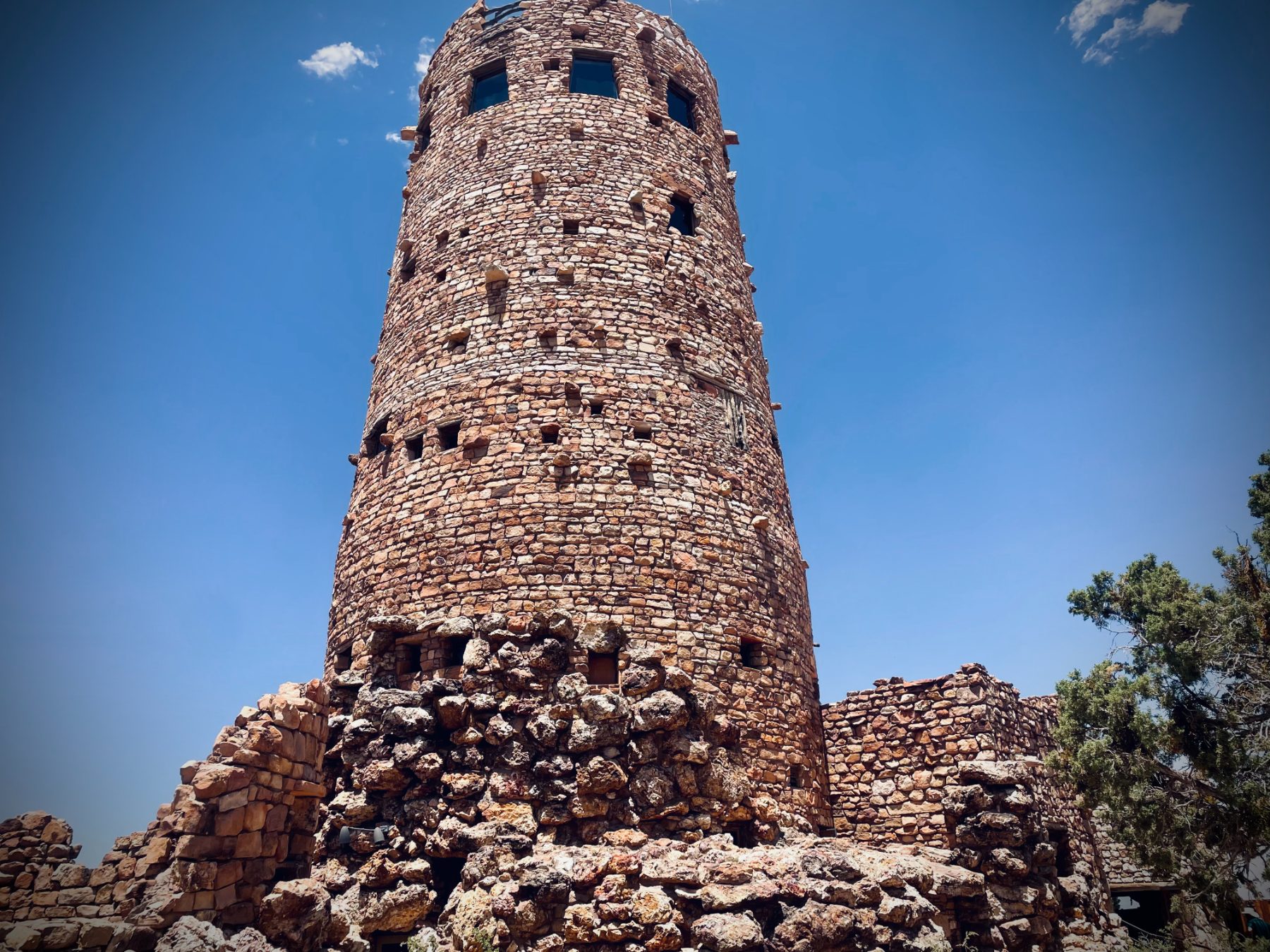 The stone tower against open sky